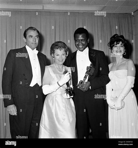 Sidney Poitier First Black Man To Win A Top Movie Oscar Holds His Award For Best Actor For His