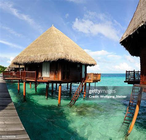 Maldives Overwater Bungalow Photos and Premium High Res Pictures ...