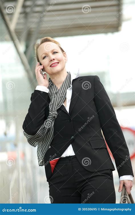 Portrait Of A Professional Business Woman On The Phone Outside Stock