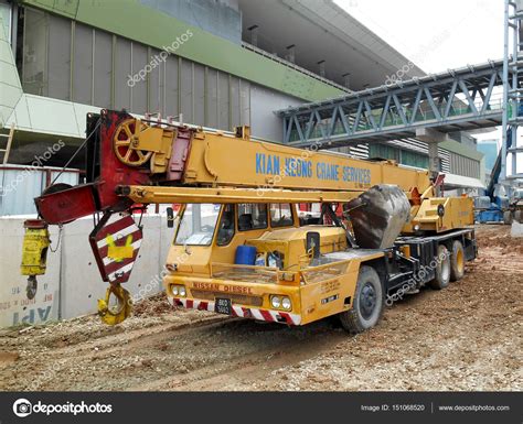 Mobile crane used to lifting heavy material at construction site ...