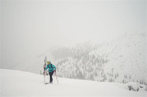 Premium Photo | A person is skiing on a snowy mountain