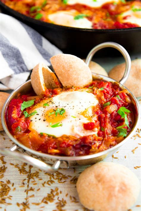 Shakshuka Recipe Eggs Poached In Bell Pepper And Tomato Sauce