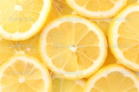 Lemon slices background — Stock Photo © belchonock #22903698