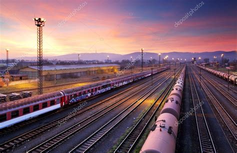 Cargo freight train railroad station Stock Photo by ©TTstudio 39153061