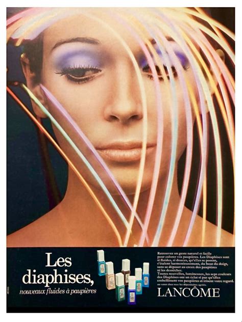 An Advertisement For Lancome Cosmetics Featuring A Woman S Face