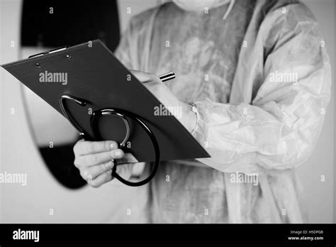 doctor stethoscope file black and white Stock Photo - Alamy