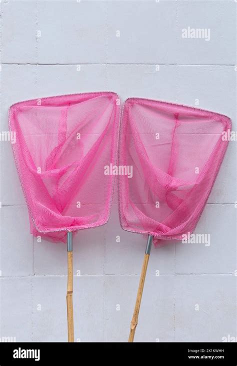 Pink Fishing Nets For Kids Stock Photo Alamy