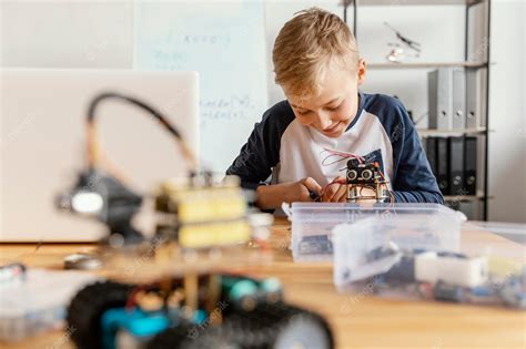 Premium Photo | Child making robot