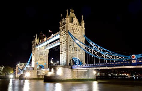 The Illuminated Tower and the Tower Bridge of London by Night Stock ...