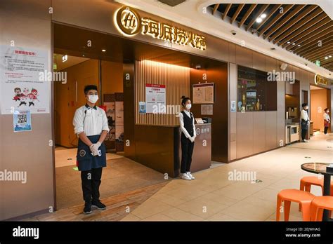 Staff Of Haidilao Restaurant A Chain Of Hot Pot Restaurants That Reopens Its Branches In