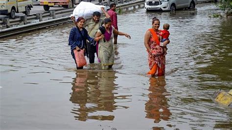 Delhi Ncr Rains Heavy Rainfall Leaves Roads Waterlogged Imd Issues