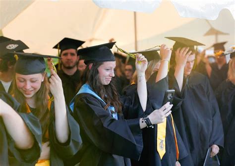 ‘Continue to make us proud’: Spirits high as Smith Voc grads step off