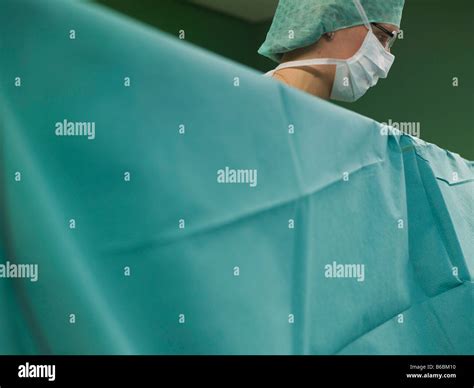 Surgeon in operating room Stock Photo - Alamy