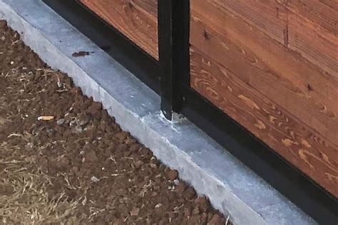 How to Install a Fence Mounted to Concrete (A Better Approach)