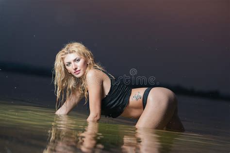 Blonde Woman In Water After Sunset Stock Image Image Of Beauty