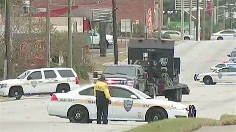 Robbery Suspect Surrenders After 11 Hostages Taken At Florida Bank