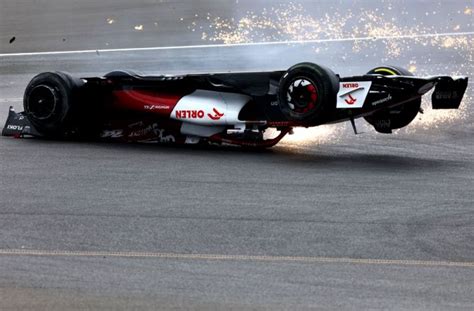 Pix Zhous Horror Crash Rocks British F1 Grand Prix Rediff Sports