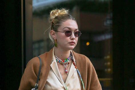 Gigi Hadid Gets Wild In Leopard Loafers With Pink Socks And Baggy Jeans