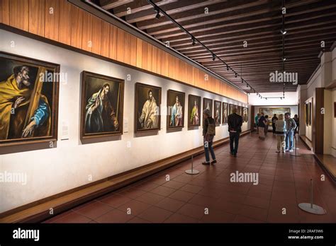 Toledo El Greco Museum, view of people studying the series of paintings ...