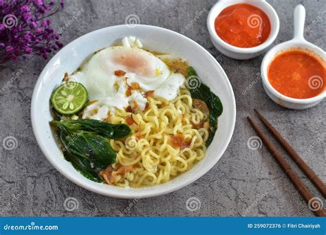 Mie Rebus Or Instant Boiled Noodles With Soto Flavor With Mustard