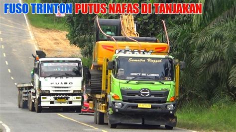 PERJUANGAN TRUK FUSO DI TANJAKAN TRUK HINO MUATAN ALAT BERAT DAN PIPA