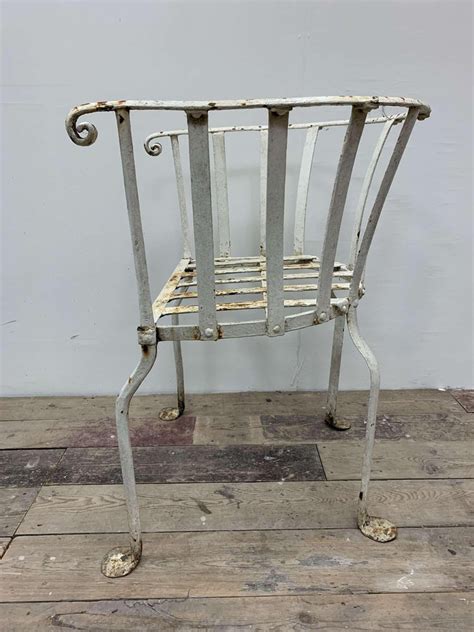 19th Century English Wrought Iron Garden Chair With Rounded Back For