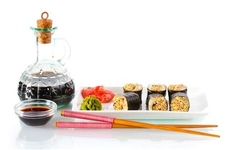 Premium Photo Tasty Rolls Served On White Plate With Chopsticks And