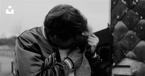 Man In Black Jacket Holding His Face Photo Free België Image On Unsplash