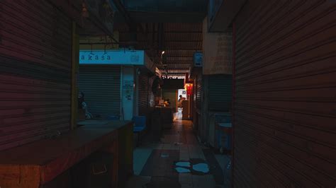 Dimly Lit Alleyway with Closed Shops 47197409 Stock Video at Vecteezy