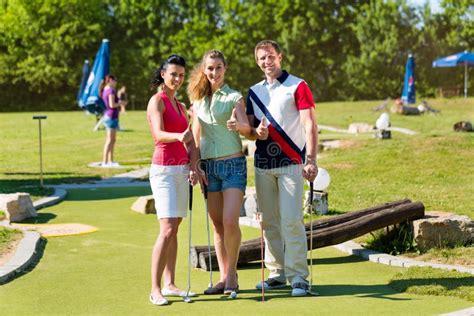 People Playing Miniature Golf Outdoors Stock Photo Image Of Activity