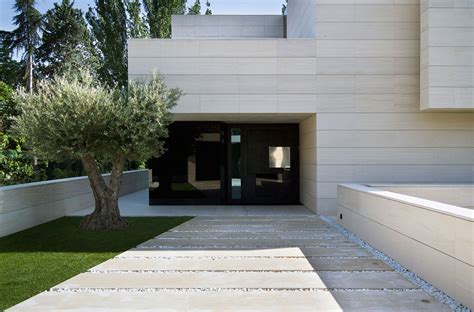 Modern Home Made Of Limestone Black Glass Design Milk