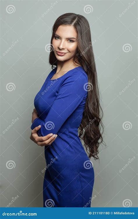 Healthy Brunette Woman Wearing Blue Dress On White Background Stock