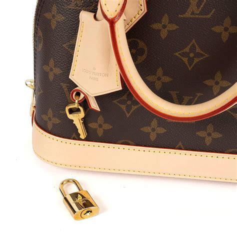 LOUIS VUITTON Brown Monogram Canvas ALMA BB Shoulder Bag For Sale At