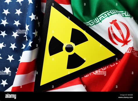 Flags Of The Usa And Iran And Radioactivity Warning Iranian Nuclear