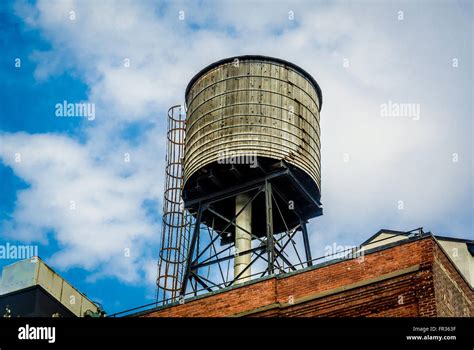 Traditional Wooden Water Tower On Roof Of Building New York City Usa