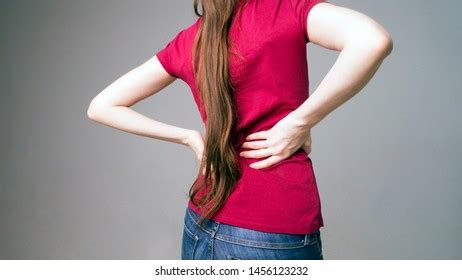 Tired Woman Feeling Pain Massaging Tense Stock Photo