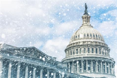 Premium Photo | Capitol building in washington dc during snow storm