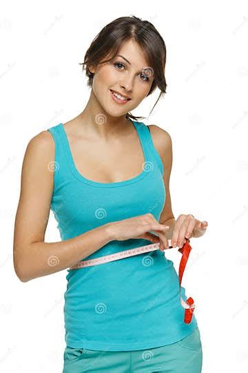 Woman Measuring Her Waist With A Measuring Tape Stock Photo Image Of