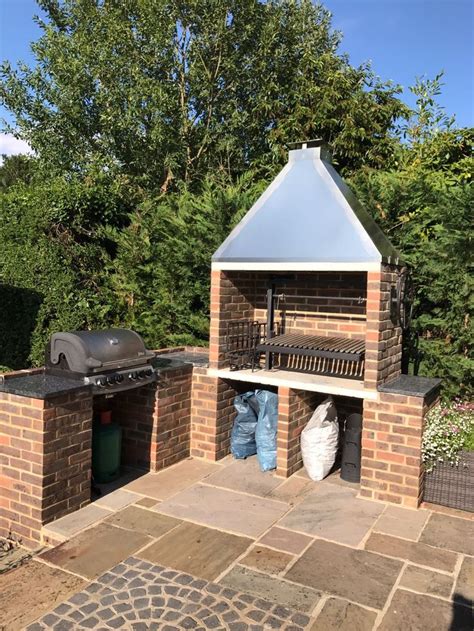 Argentinian Grill Installed In An Outdoor Kitchen Backyard Grilling