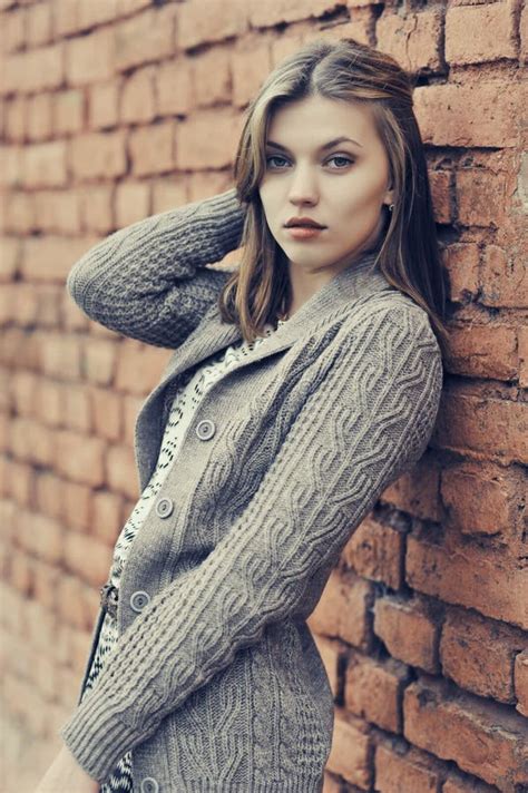 Young Beautiful Girl Standing Against The Wall Stock Photo Image Of