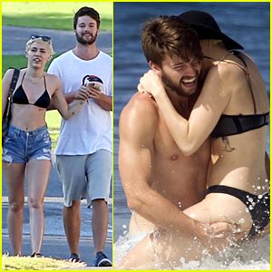 Miley Cyrus Flaunts PDA With Patrick Schwarzenegger In Hawaii Bikini Miley Cyrus Patrick