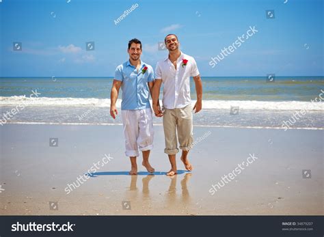 Two Gay Men Walking On Beach Stock Photo Shutterstock