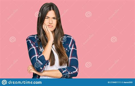 Young Brunette Woman Wearing Casual Clothes Thinking Looking Tired And