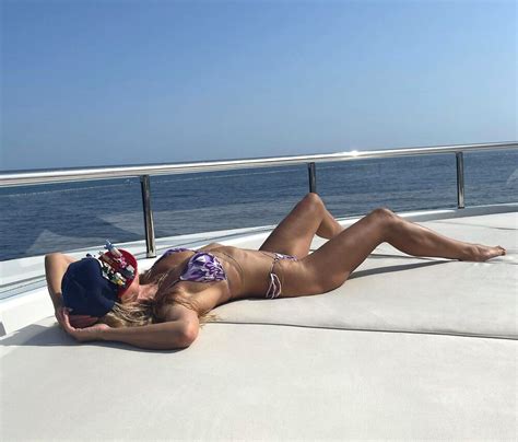 Heidi Klum Tops Her Tiny Purple Bikini With A Head Turning Hat During Yacht Vacation With