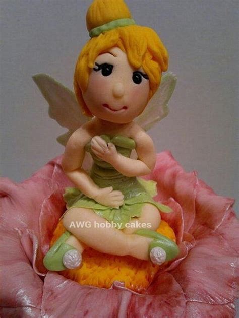 Tinkerbell Topper Decorated Cake By Awg Hobby Cakes Cakesdecor