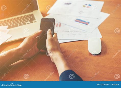 Young Man Working Using Smartphone And Notebook Computer Young Stock