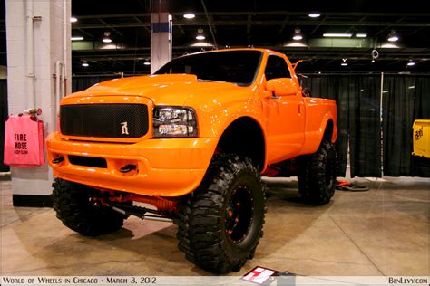 Lifted Orange Ford F 350