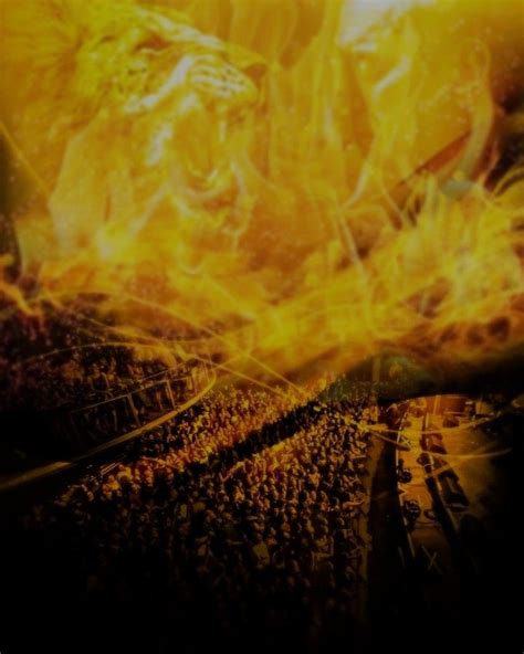 An Image Of A Crowd In Front Of A Large Fireball With Flames Coming Out