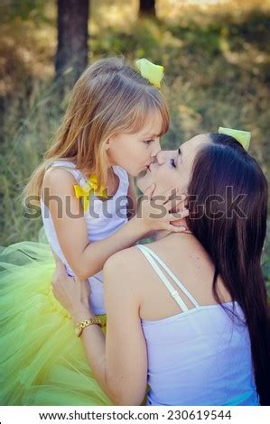 Mother Daughter Kissing Images Search Images On Everypixel