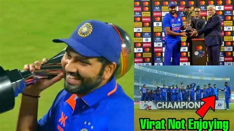 India Pull Up The Trophy And Rohit Sharma Take Trophy And India Win